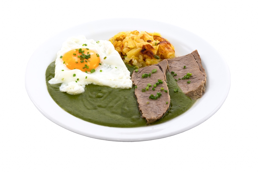 Spinat mit Ei, Rösti und Rindfleisch ist bei frömmel's Mittagstisch im 7. Bezirk beliebt.
